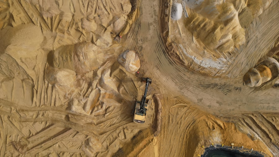 Aerial view of site preparation on sandy ground