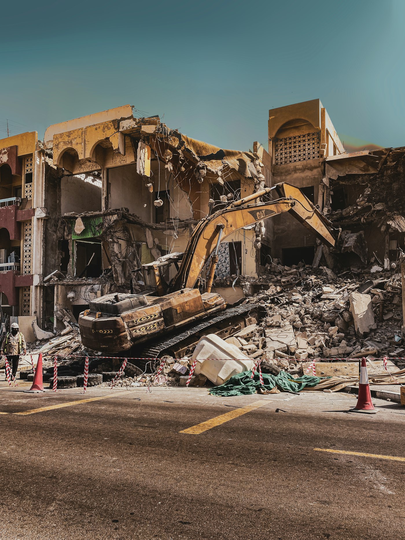 Partially demolished concrete structure and rubble